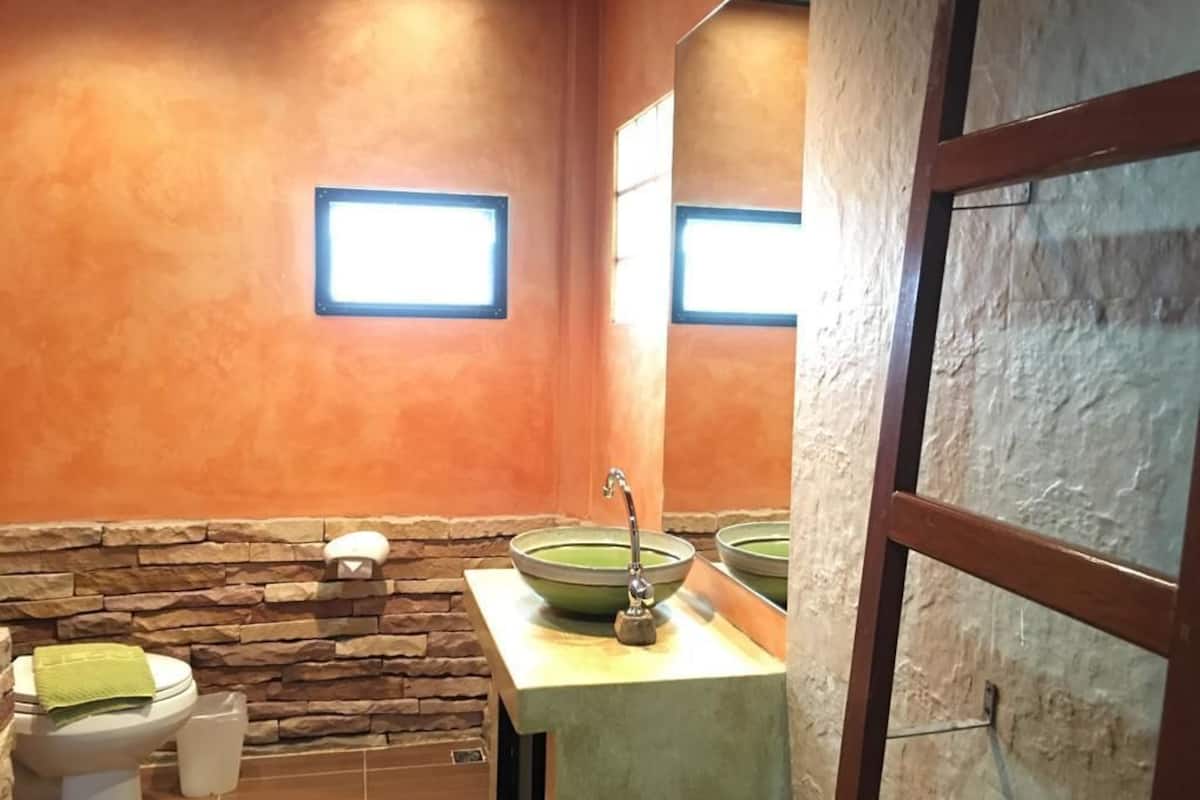 studio double room | bathroom | shower, hair dryer, towels