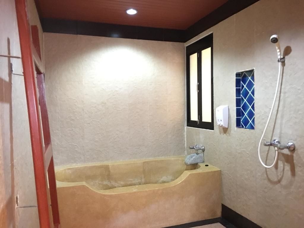 standard double room - building  | bathroom | shower, hair dryer, towels