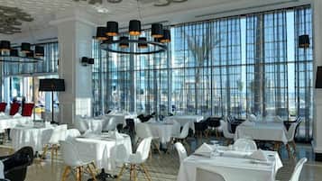 4 restaurants, breakfast, lunch, dinner served; international cuisine