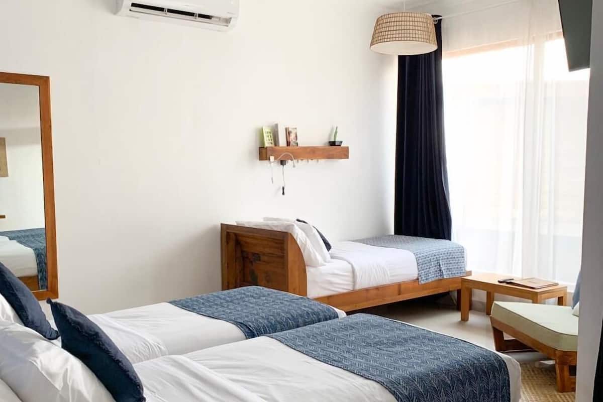 Partial Sea View Triple | Minibar, in-room safe, free WiFi