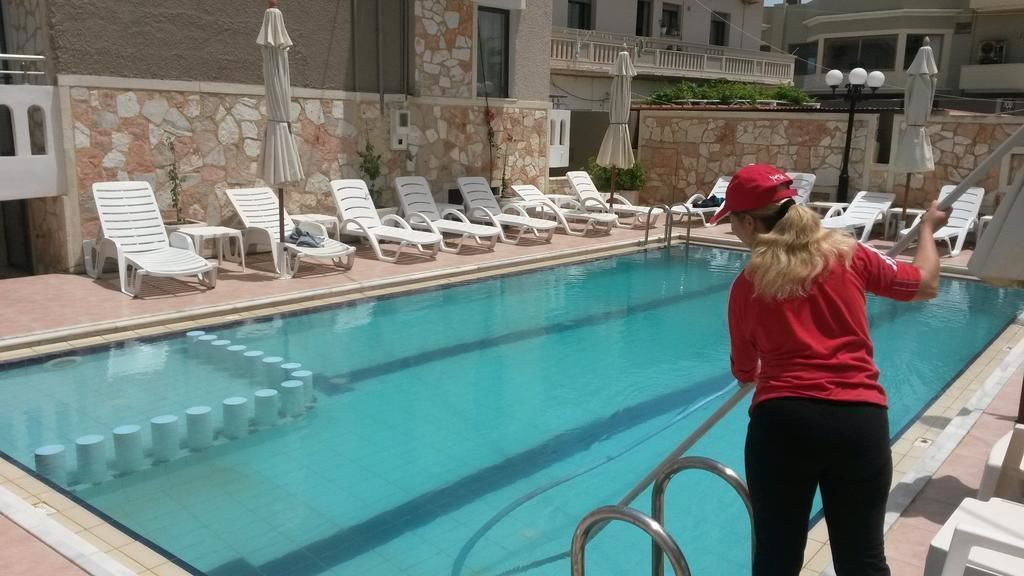 seasonal outdoor pool, pool umbrellas, pool loungers