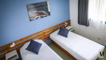 Desk, soundproofing, iron/ironing board, free cots/infant beds