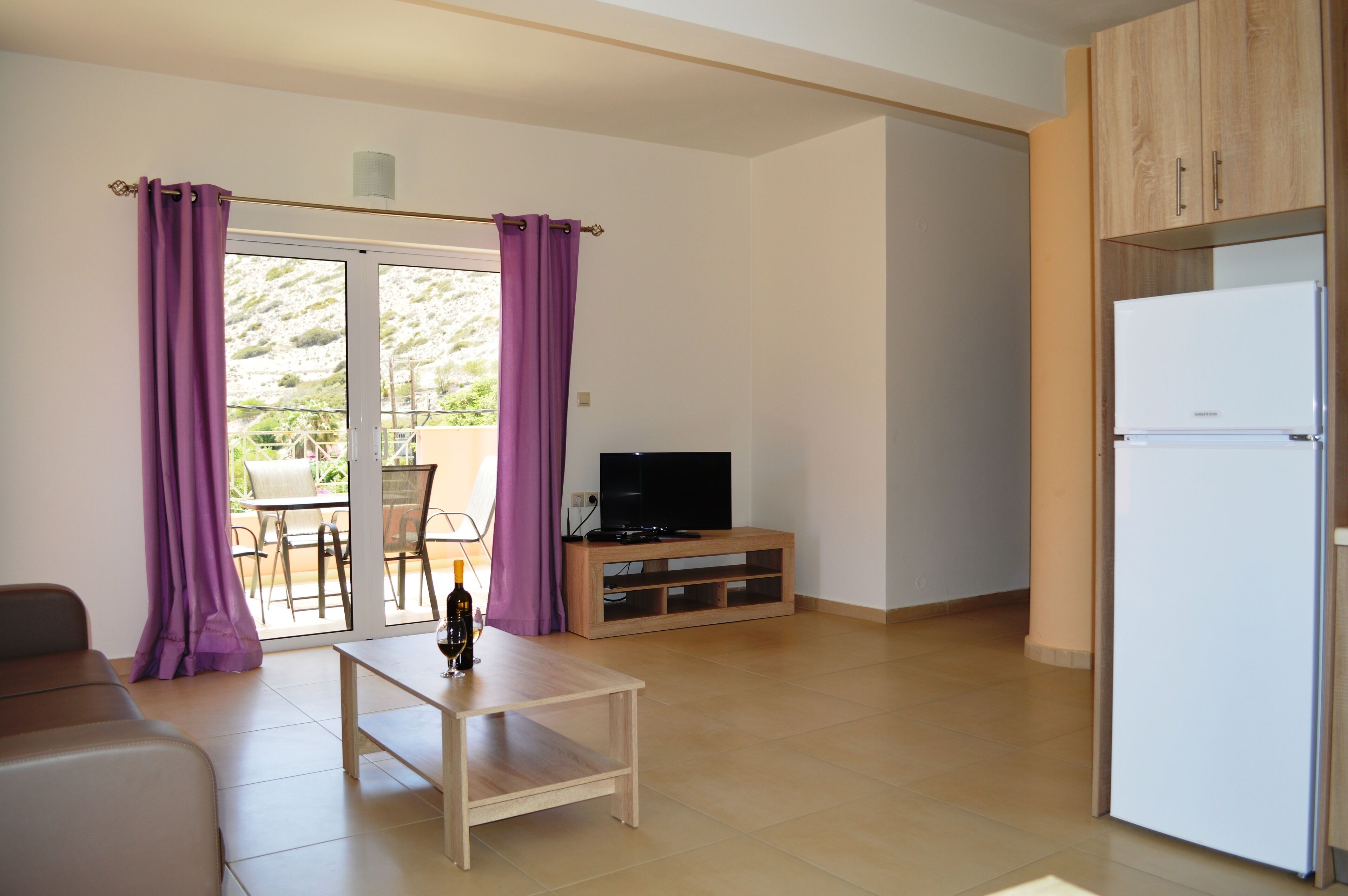 apartment, 2 bedrooms | living area | 25-inch flat-screen tv with satellite channels, tv