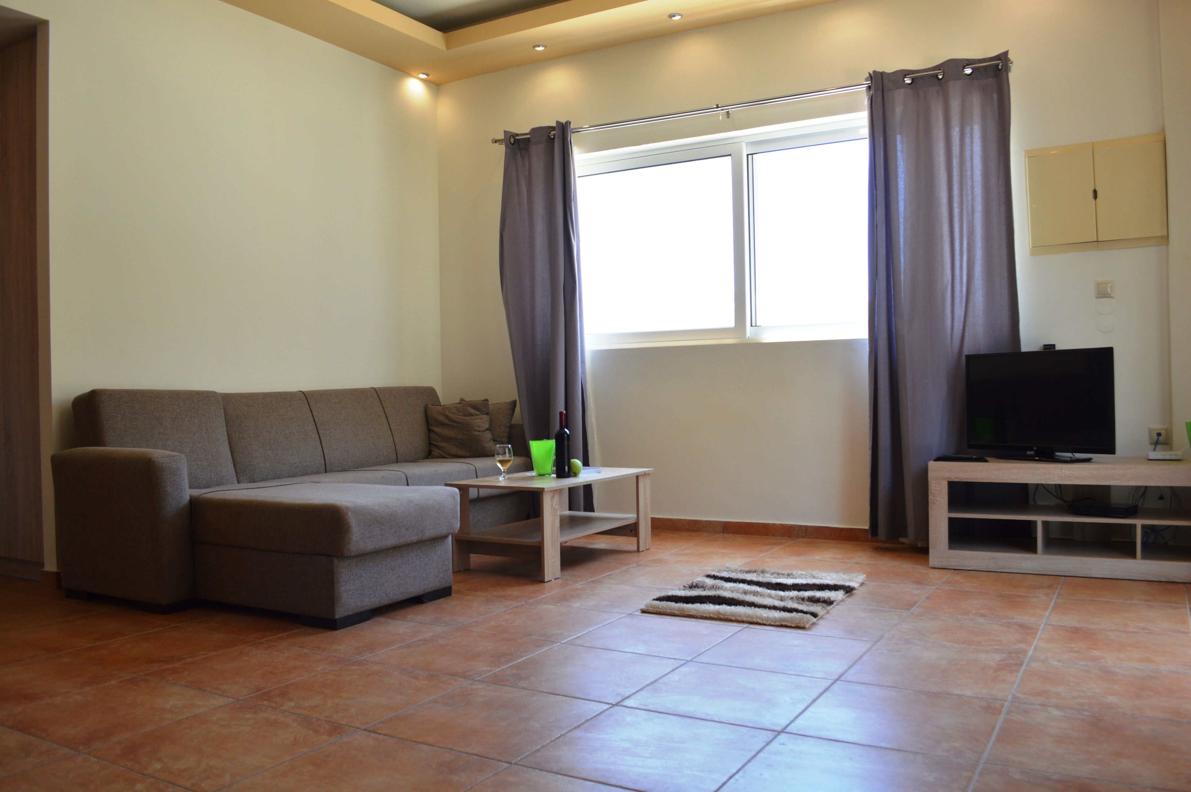 apartment, 2 bedrooms | living area | 25-inch flat-screen tv with satellite channels, tv