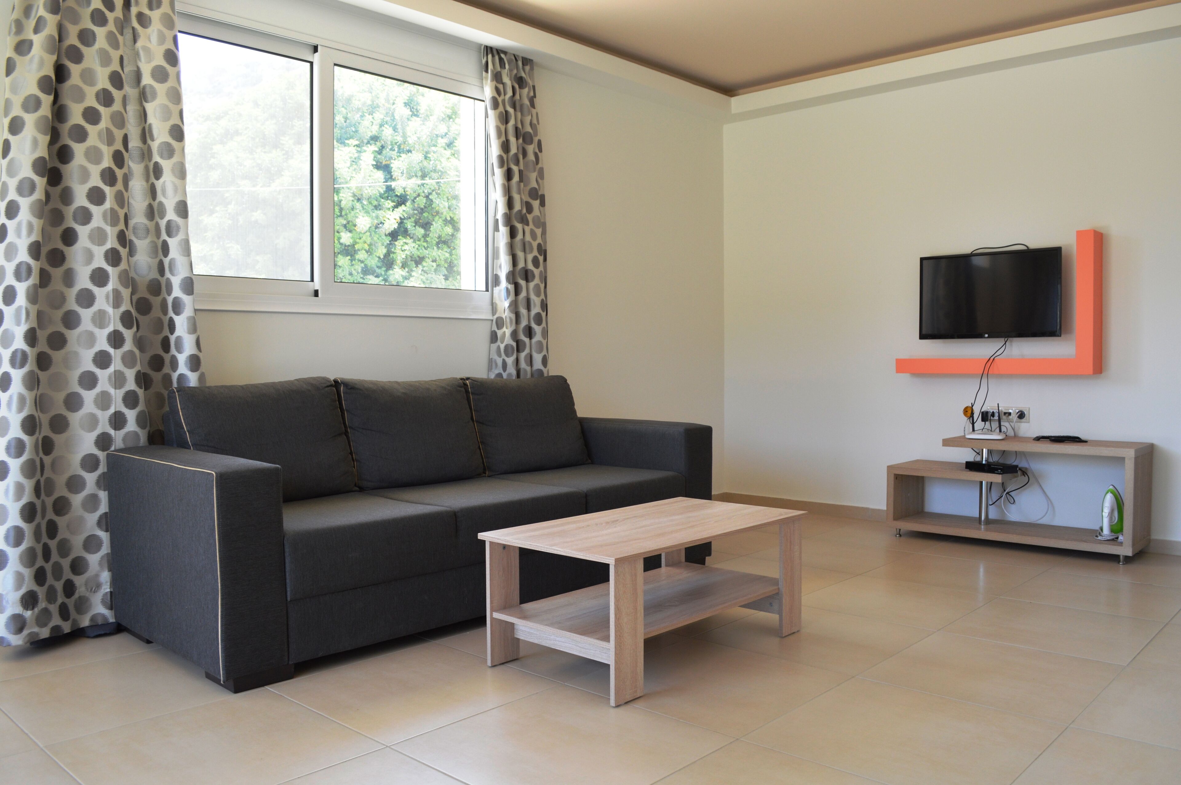 apartment, 2 bedrooms | living area | 25-inch flat-screen tv with satellite channels, tv