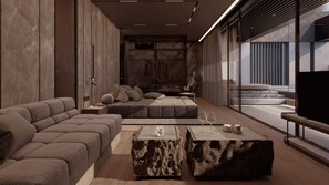 A modern living room with a sectional sofa, a coffee table, and a seating area with cushions. - NEMA Design Hotel & Spa - Small Luxury Hotels of the World (Hersonissos)