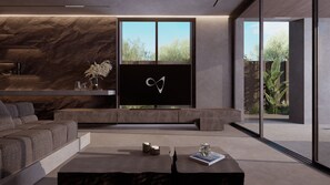 Suite – premium | Oppholdsområde | En 43-tommers Flatskjerm-TV med Parabol-TV samt TV