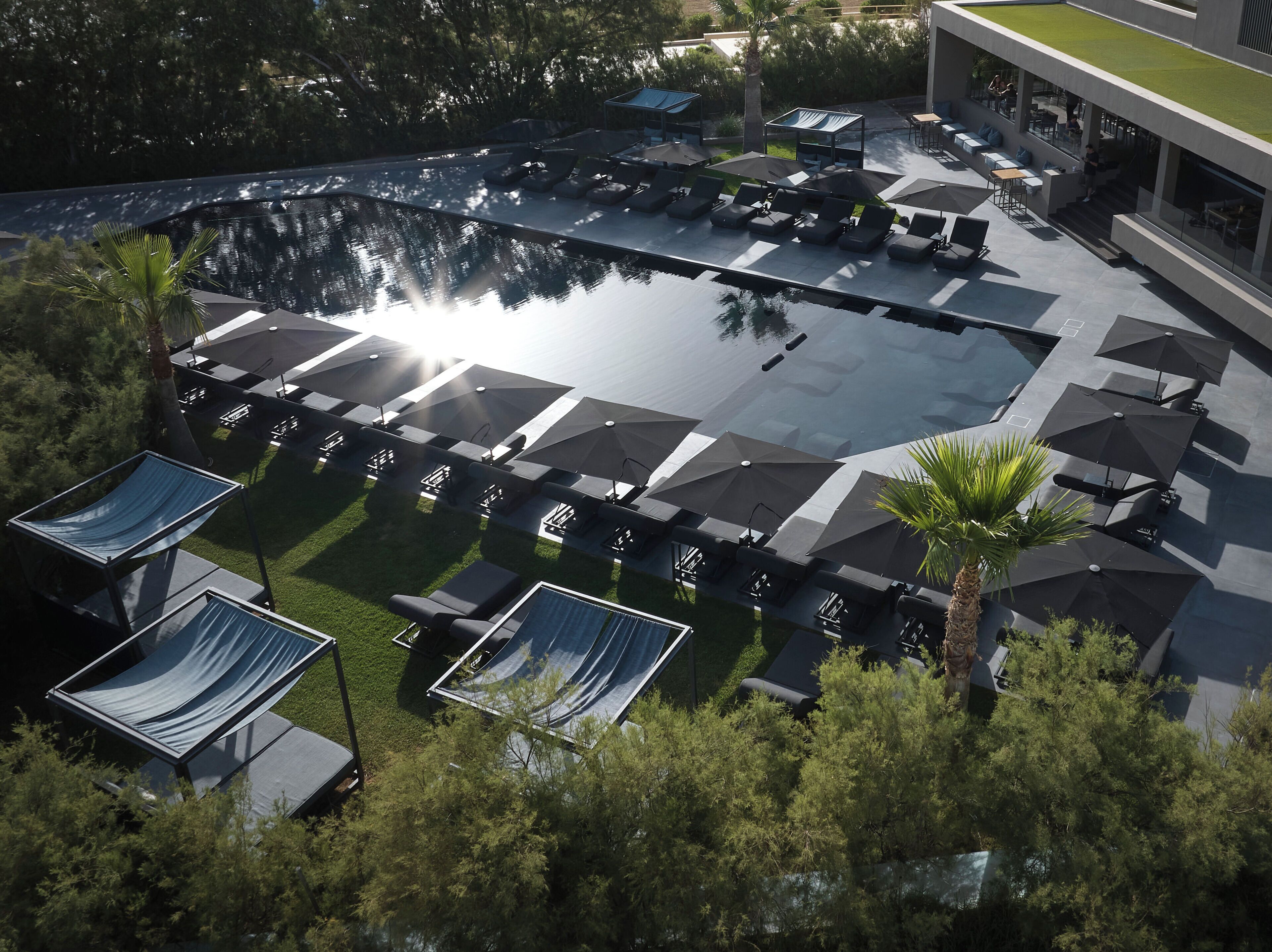 Outdoor pool, open 11:00 AM to 6:00 PM, free cabanas, pool umbrellas