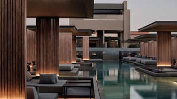 Outdoor pool, open 11:00 AM to 6:00 PM, free cabanas, pool umbrellas