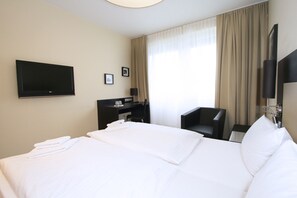 Luxe beddengoed, een bureau, gratis wifi