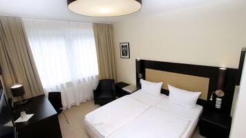 Ropa de cama de alta calidad, escritorio y wifi gratis