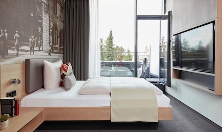 Premium bedding, in-room safe, desk, soundproofing