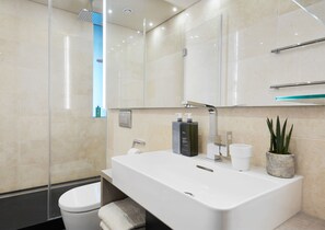 Rainfall showerhead, eco-friendly toiletries, hair dryer, towels
