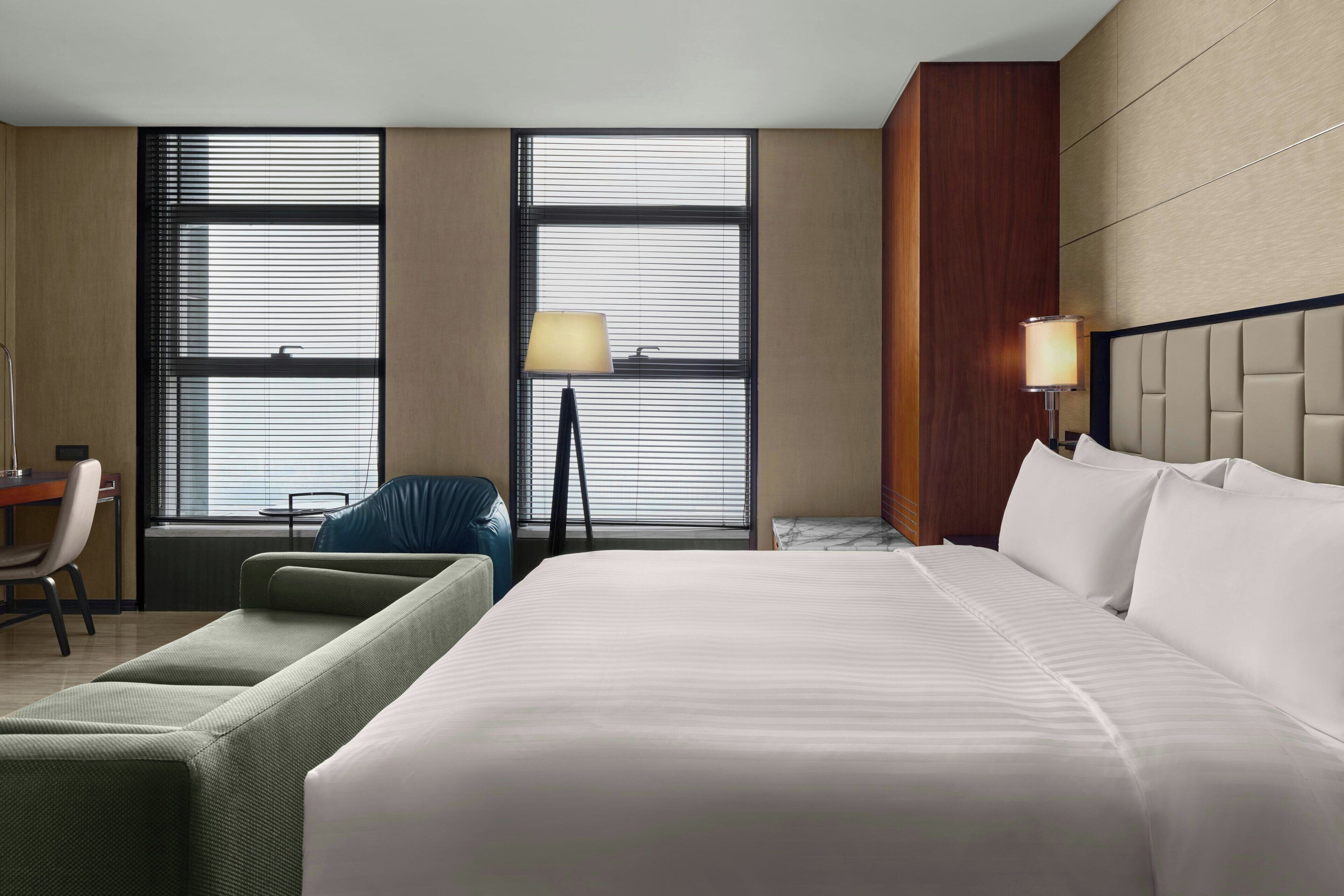 Premium bedding, down duvets, pillow-top beds, in-room safe