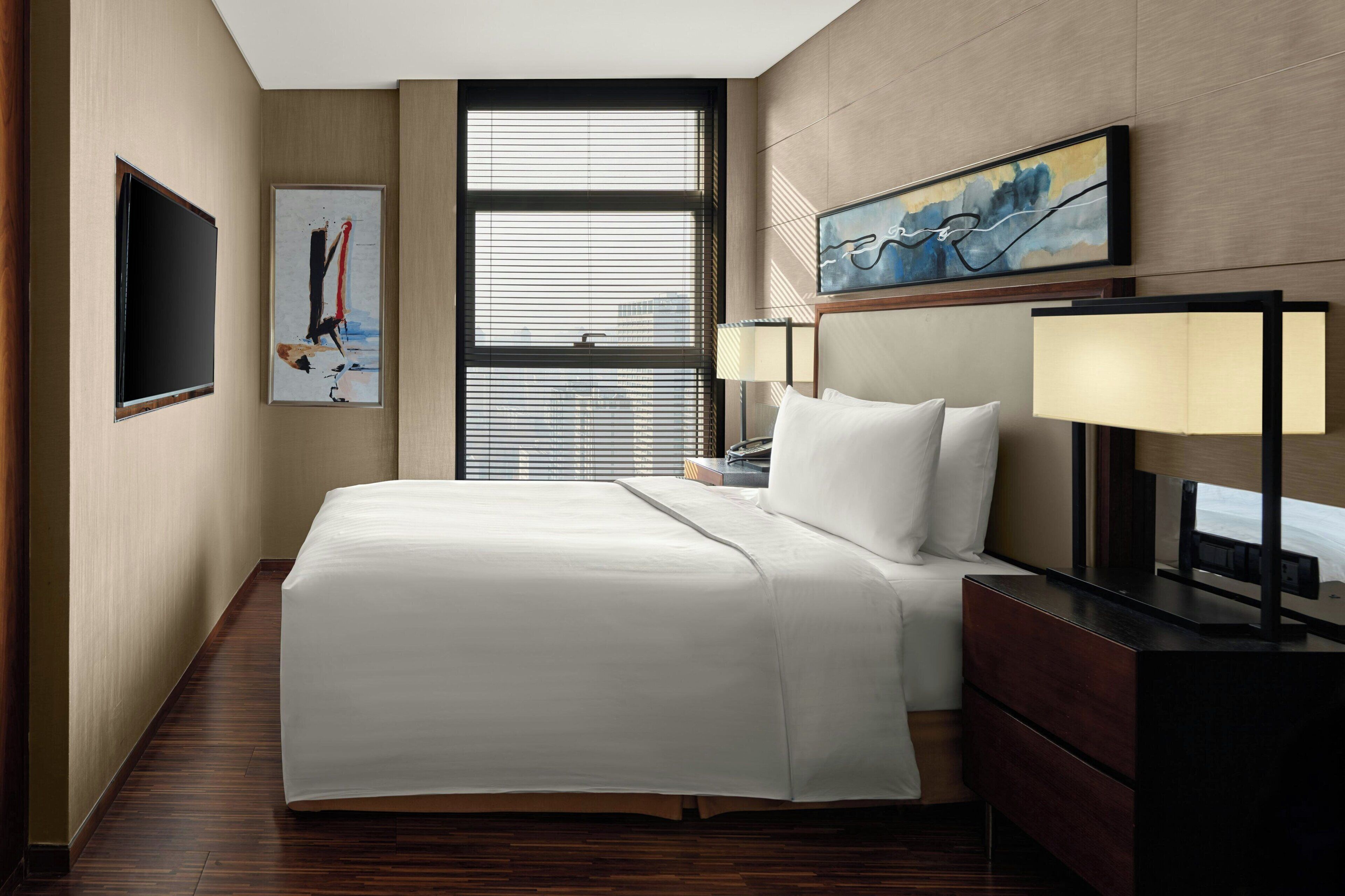 Premium bedding, down duvets, pillow-top beds, in-room safe