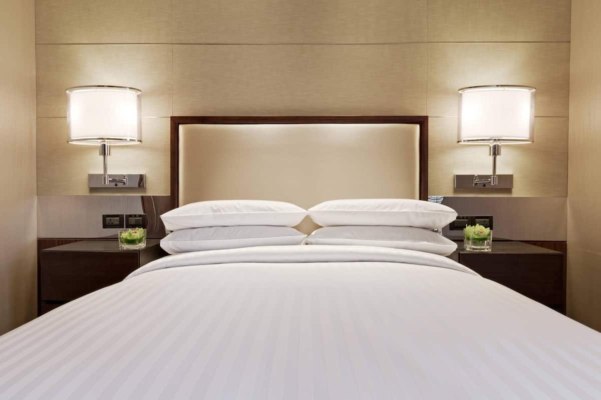 Premium bedding, down comforters, pillowtop beds, in-room safe