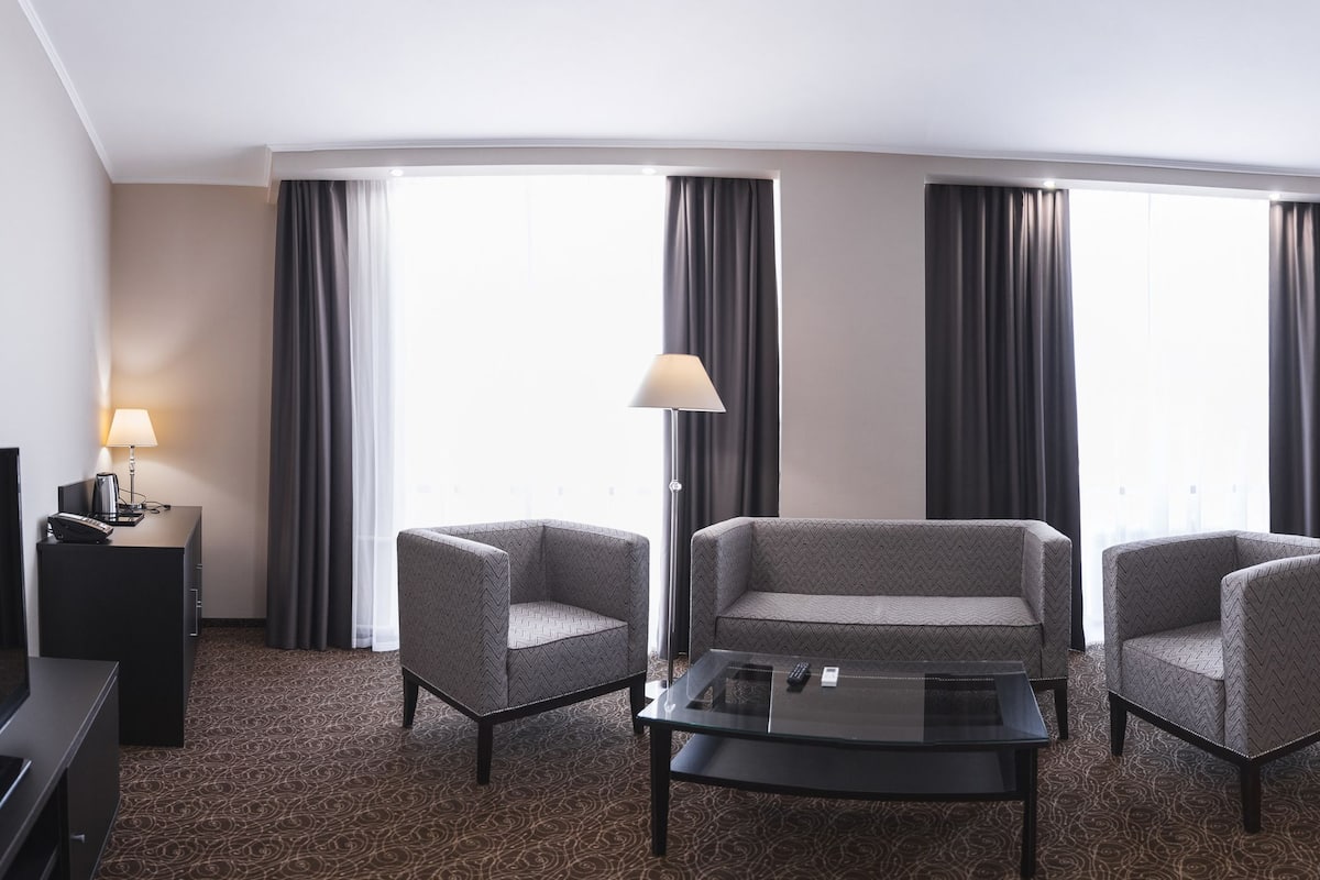 Suite, 1 Bedroom | Living area | LCD TV