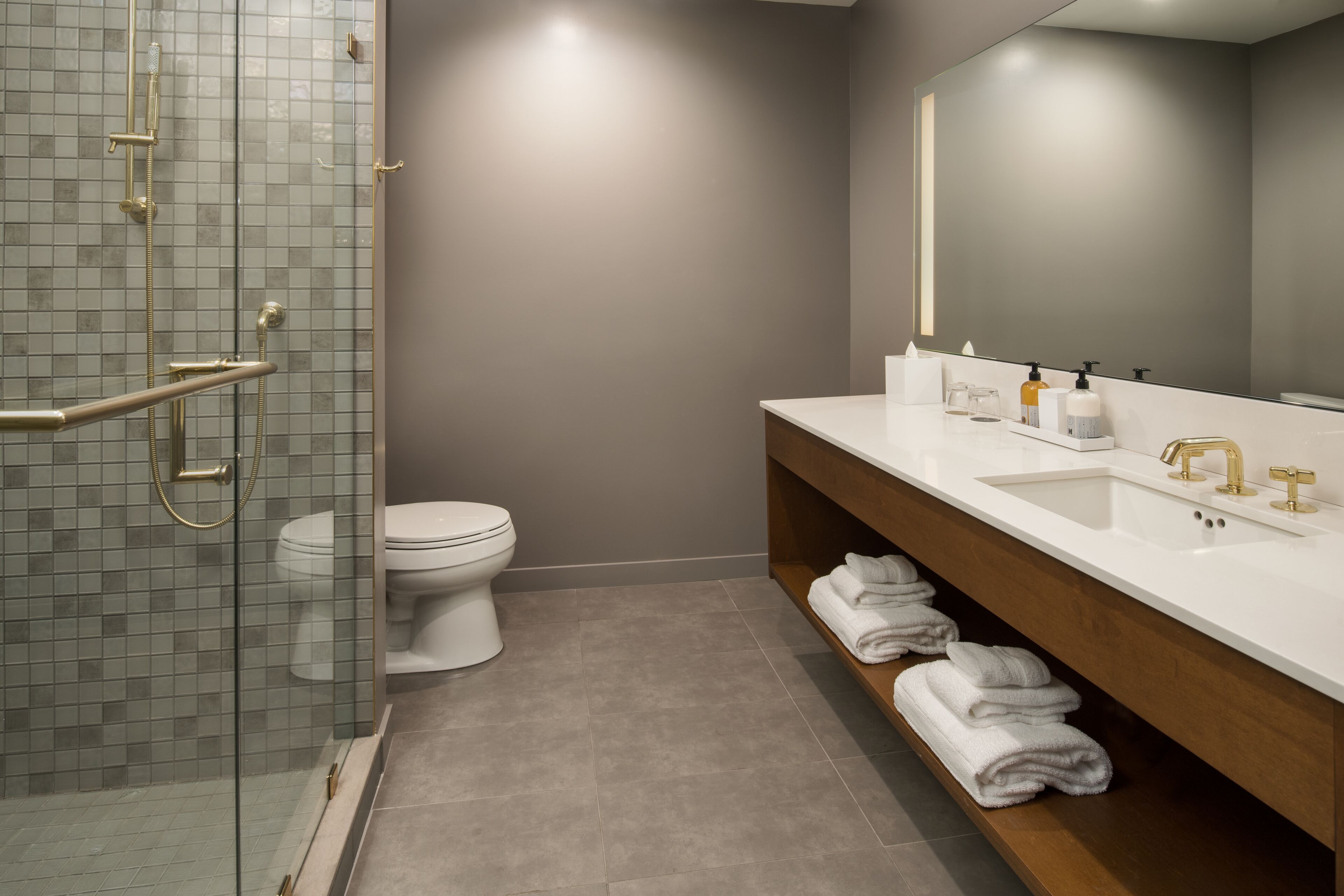 junior suite, 1 king bed, city view, corner | bathroom | shower, free toiletries, hair dryer, bathrobes