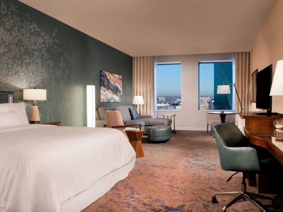 Junior Suite, 1 King Bed | Hypo-allergenic bedding, pillow-top beds, in-room safe, desk