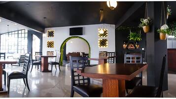 Breakfast, lunch, dinner served; international cuisine