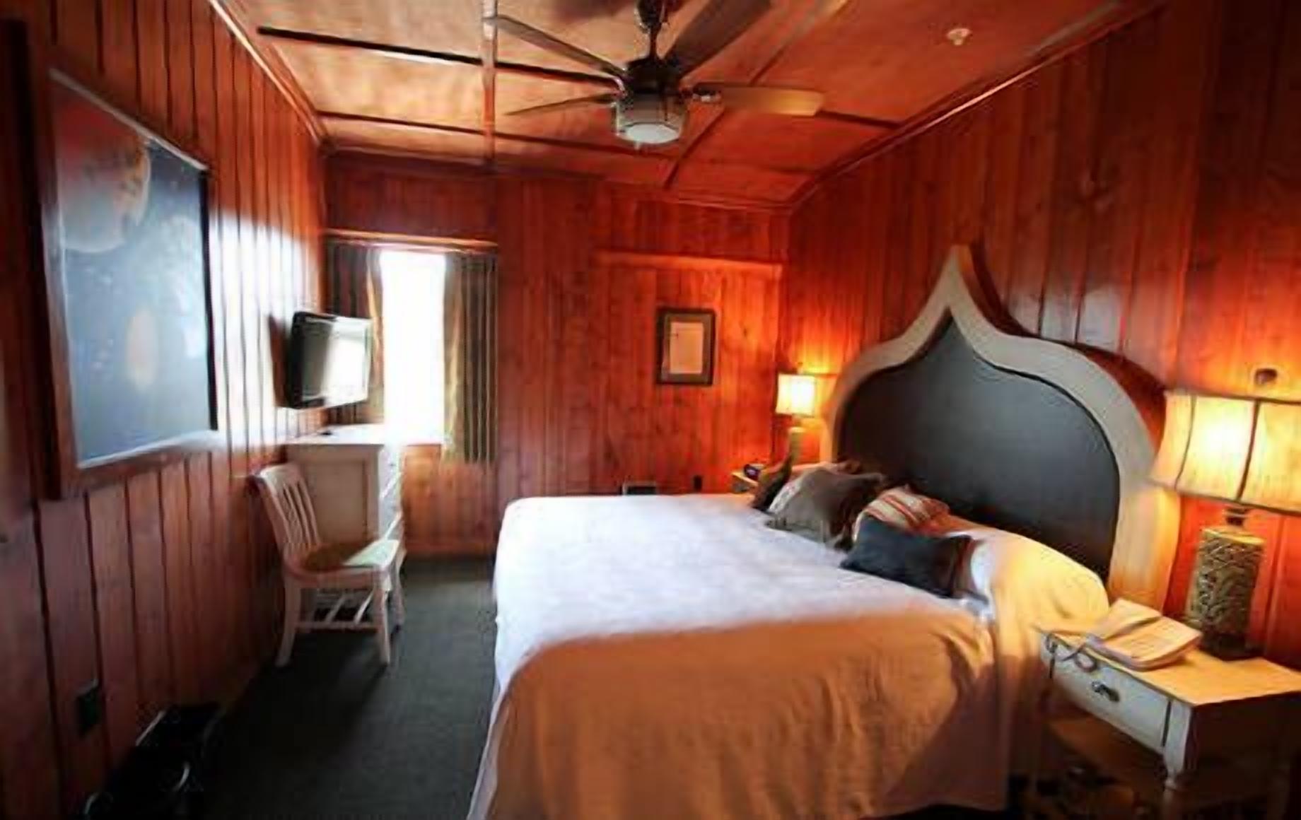 standard suite, 1 king bed | premium bedding, desk, iron/ironing board, rollaway beds