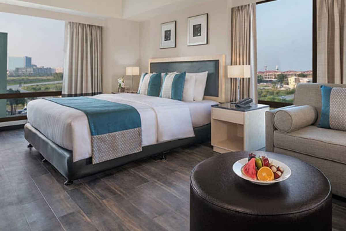 1 King Bed, Large Room with Living Area | Premium bedding, minibar, in-room safe, desk