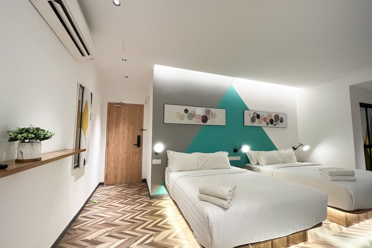 deluxe room family room 4 pax | premium bedding, free wifi, bed sheets