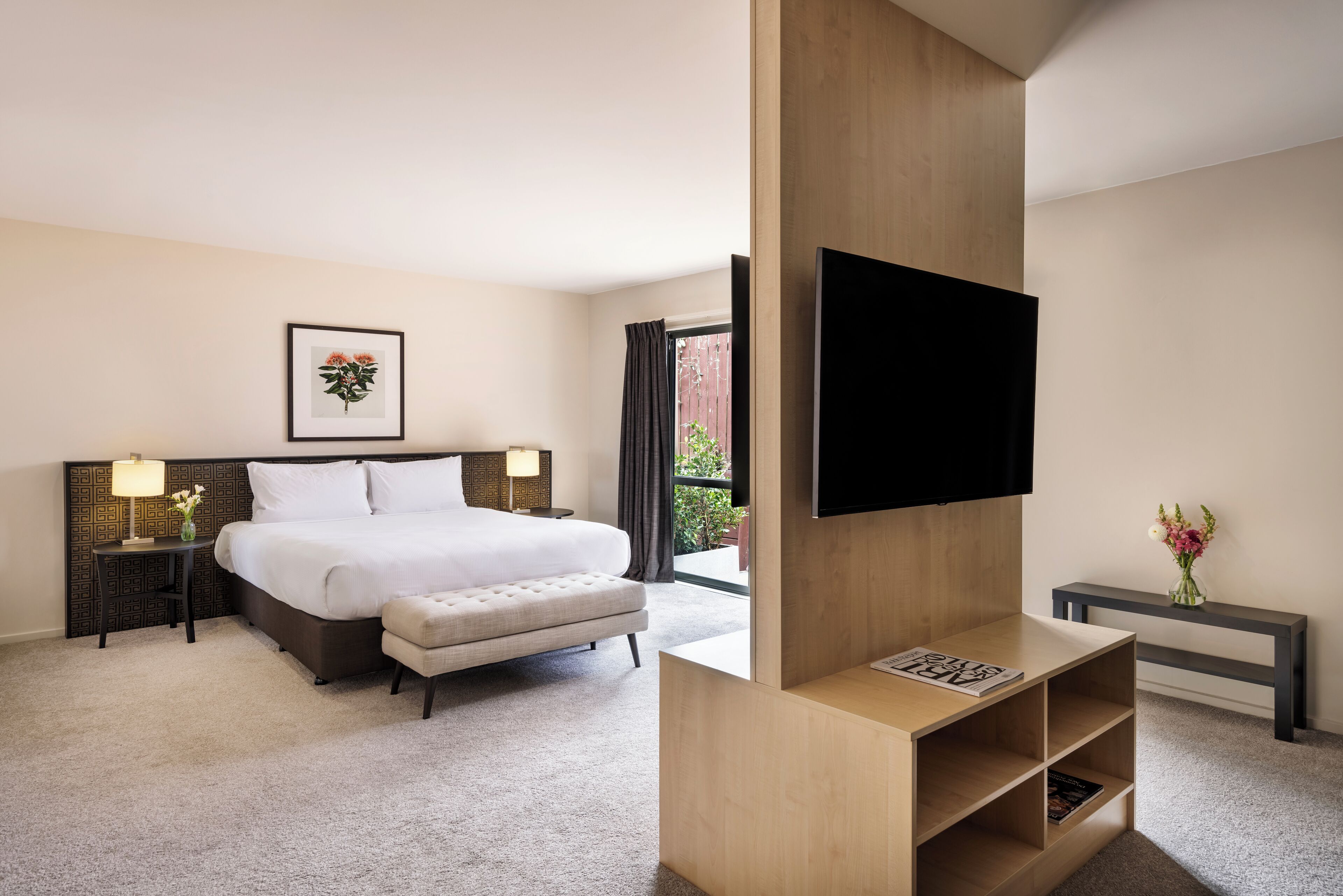 Suite Dreams | Premium bedding, desk, laptop workspace, blackout drapes