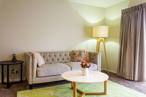 Suite Dreams | Premium bedding, desk, laptop workspace, blackout drapes