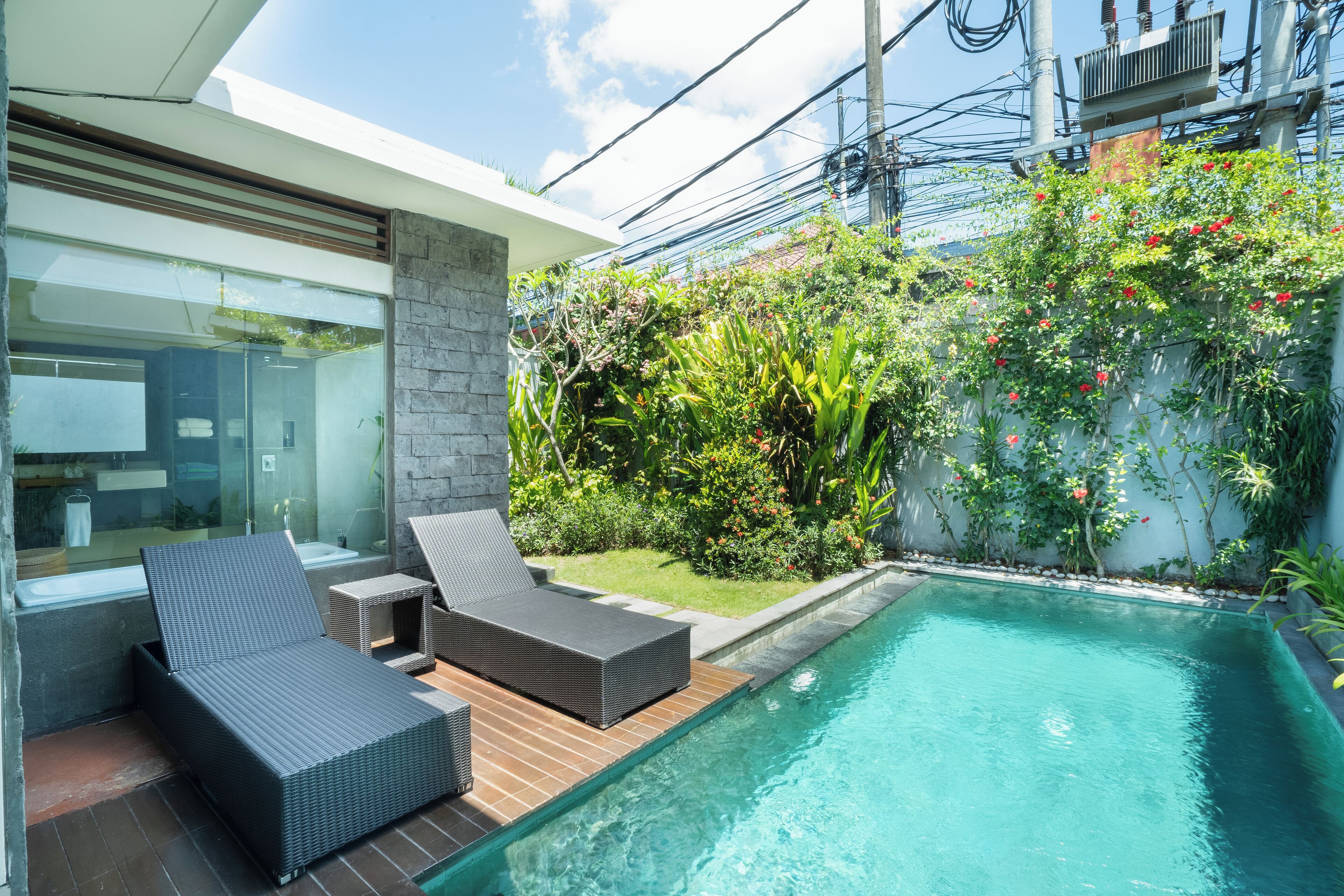 outdoor pool, pool umbrellas, pool loungers