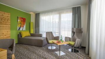 Suite, Balcony, Mountain View | Living area | Flat-screen TV