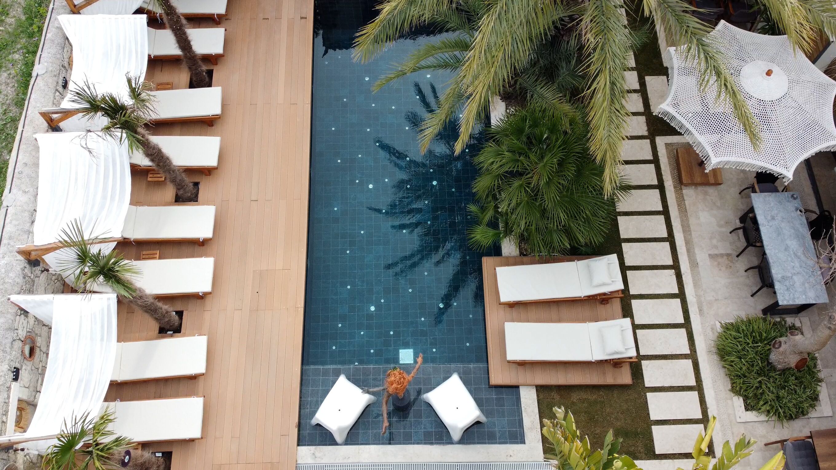 Outdoor pool, free cabanas, pool umbrellas