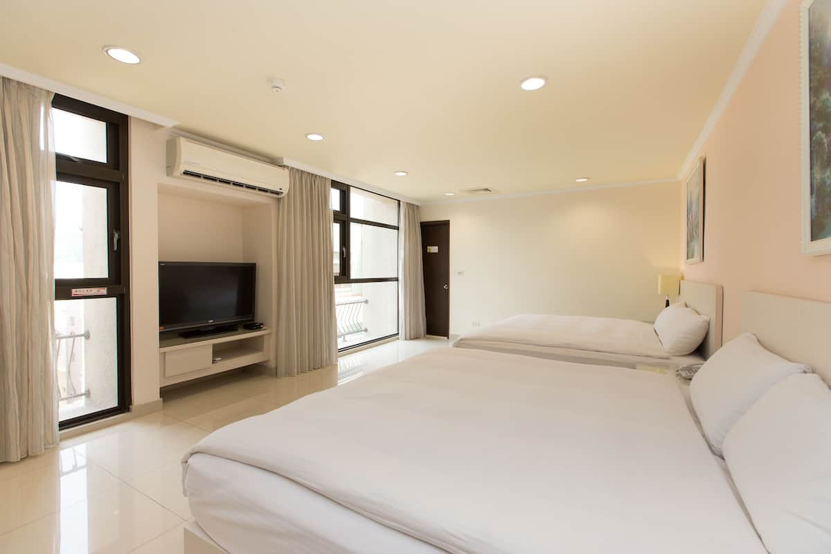 Family Room, 2 Double Beds | Free WiFi, bed sheets