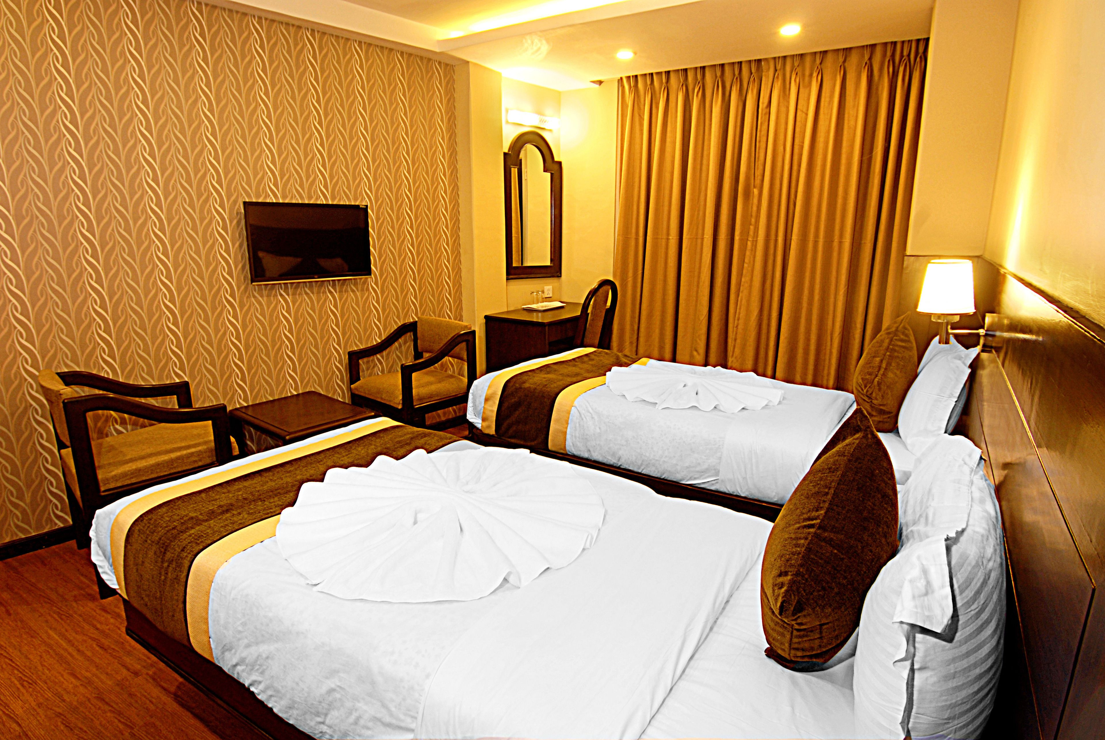 Premium bedding, desk, laptop workspace, free WiFi