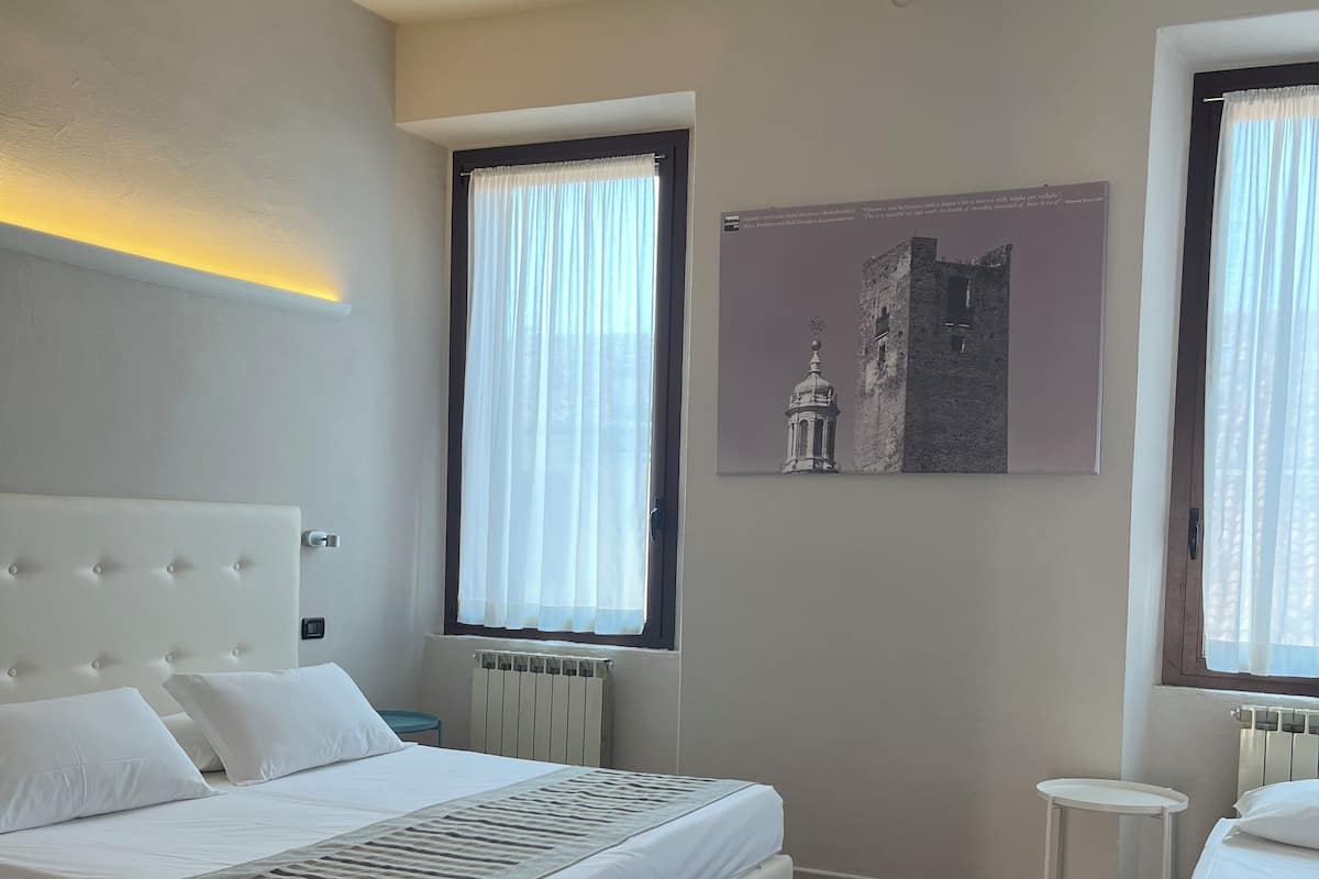 Quadruple Room, 1 Bedroom | In-room safe, desk, cribs/infant beds, free WiFi