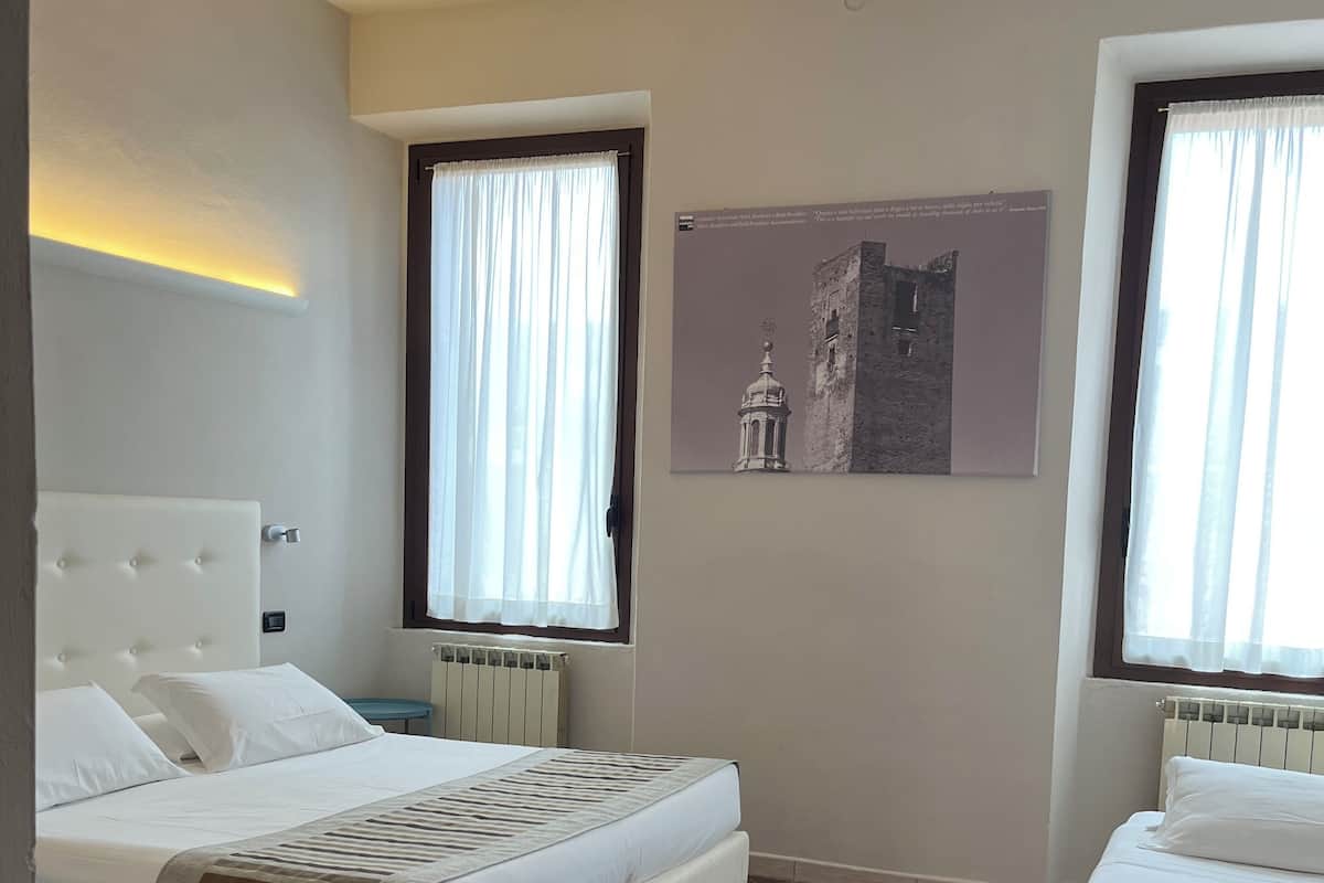 Quadruple Room, 1 Bedroom | In-room safe, desk, cots/infant beds, free WiFi
