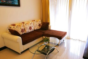 Deluxe Apartment, 1 King Bed | Living room | 32-inch LCD TV with cable channels, TV - Victorian Samui Condominium (Koh Samui)