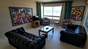 Comfort Apartment, 3 Bedrooms | Living area | 32-inch flat-screen TV with satellite channels, TV - Blouberg Beachfront Accommodation (Cape Town)
