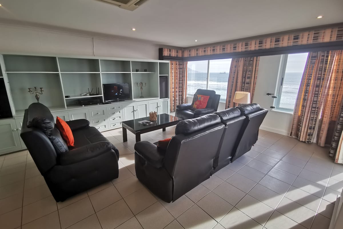Family Apartment, 3 Bedrooms | Living area | 32-inch flat-screen TV with satellite channels, TV