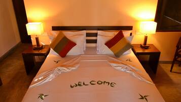 Deluxe Bungalow, 1 Queen Bed, Garden View | Minibar, in-room safe, desk, blackout curtains