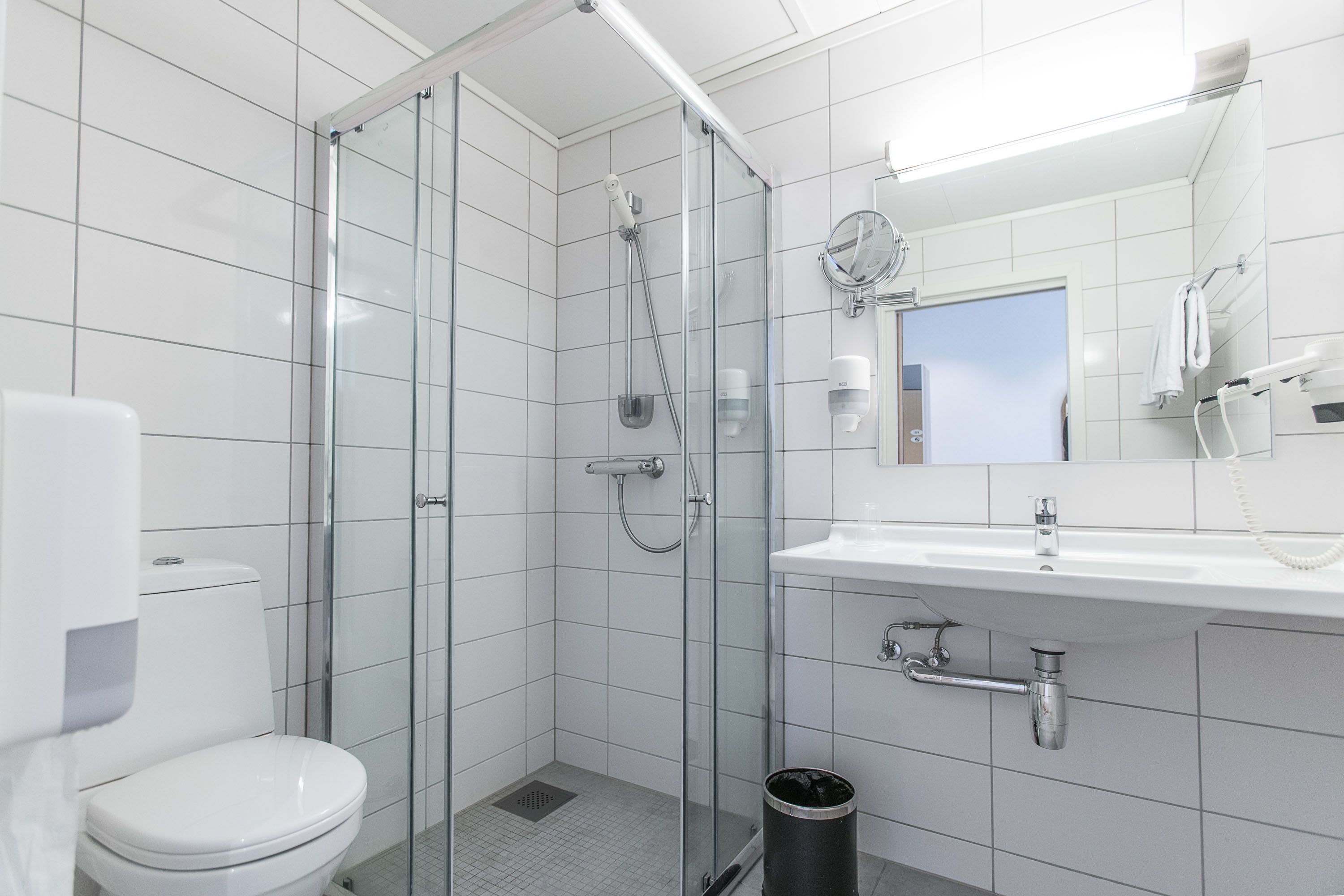 superior double room | bathroom | eco-friendly toiletries, hair dryer, towels