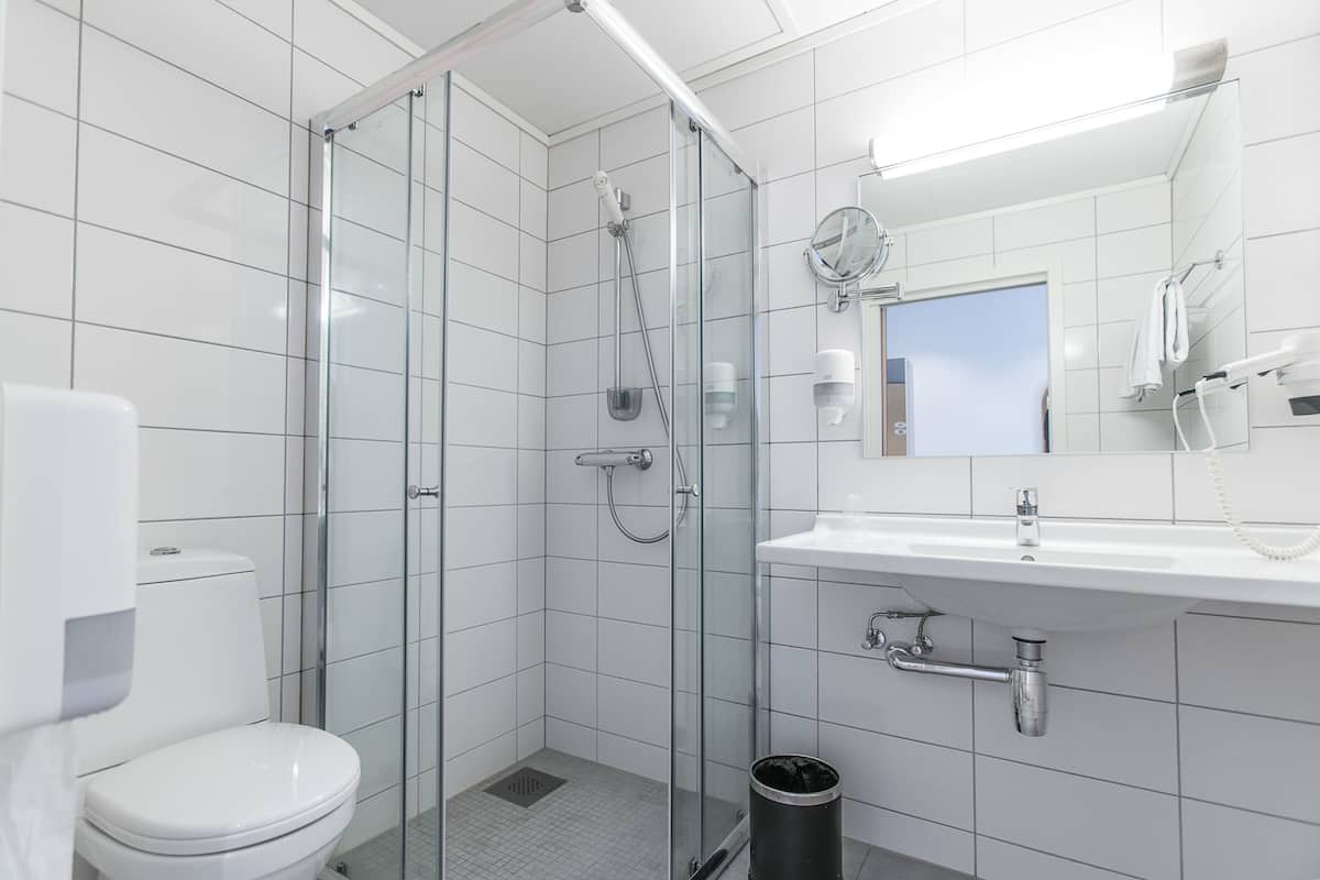 superior double room | bathroom | eco-friendly toiletries, hair dryer, towels