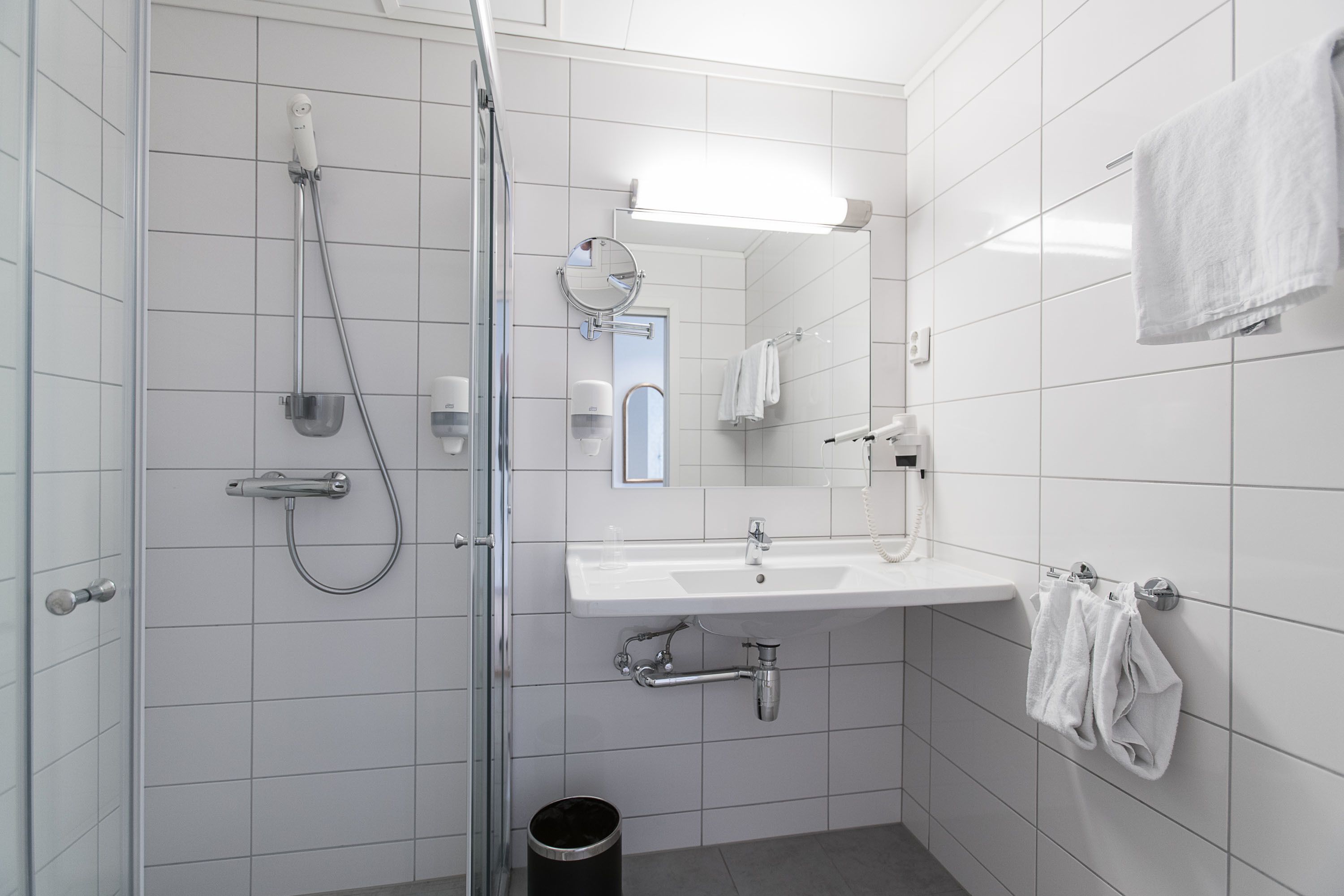 superior double room | bathroom | eco-friendly toiletries, hair dryer, towels
