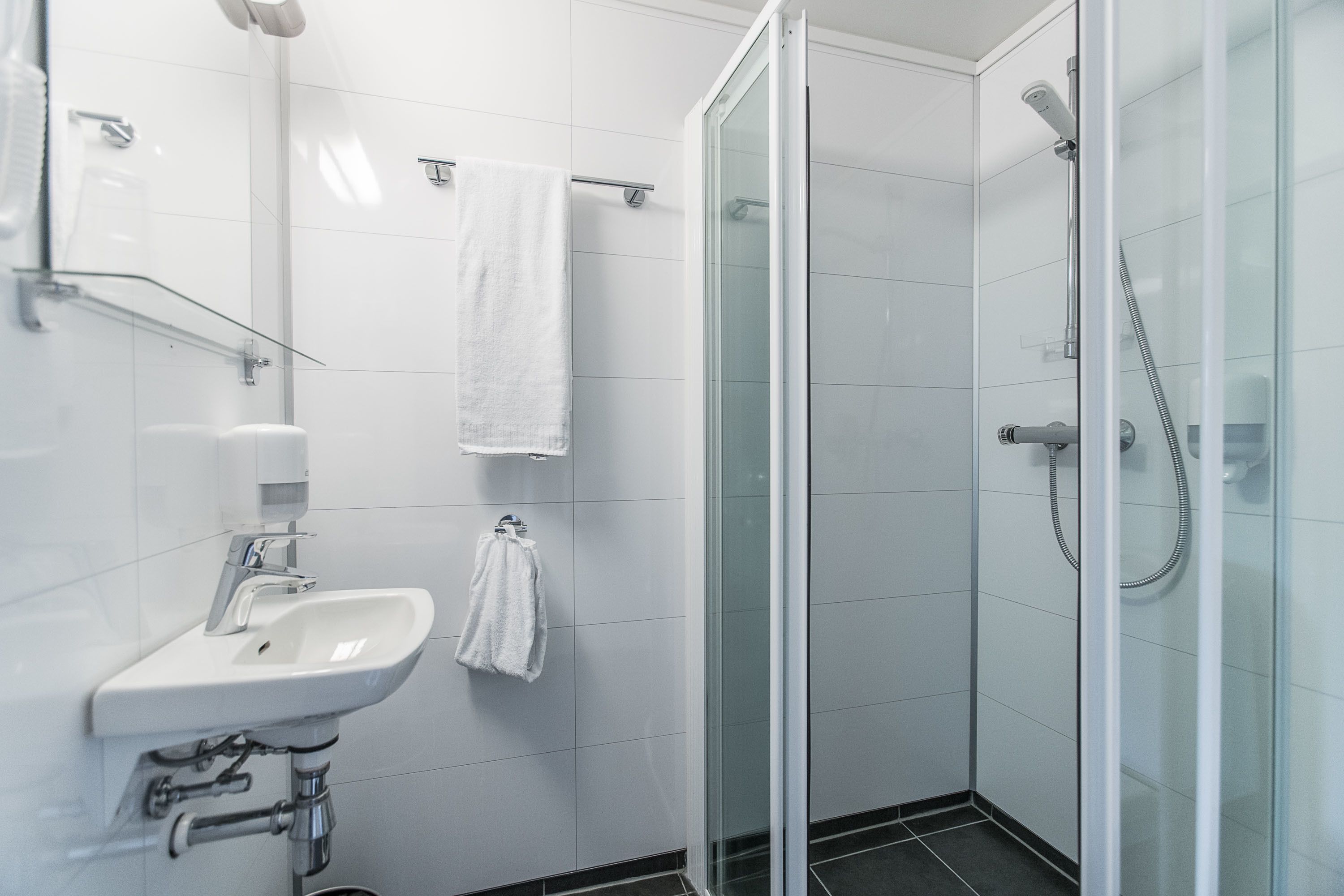 economy single room | bathroom | eco-friendly toiletries, hair dryer, towels