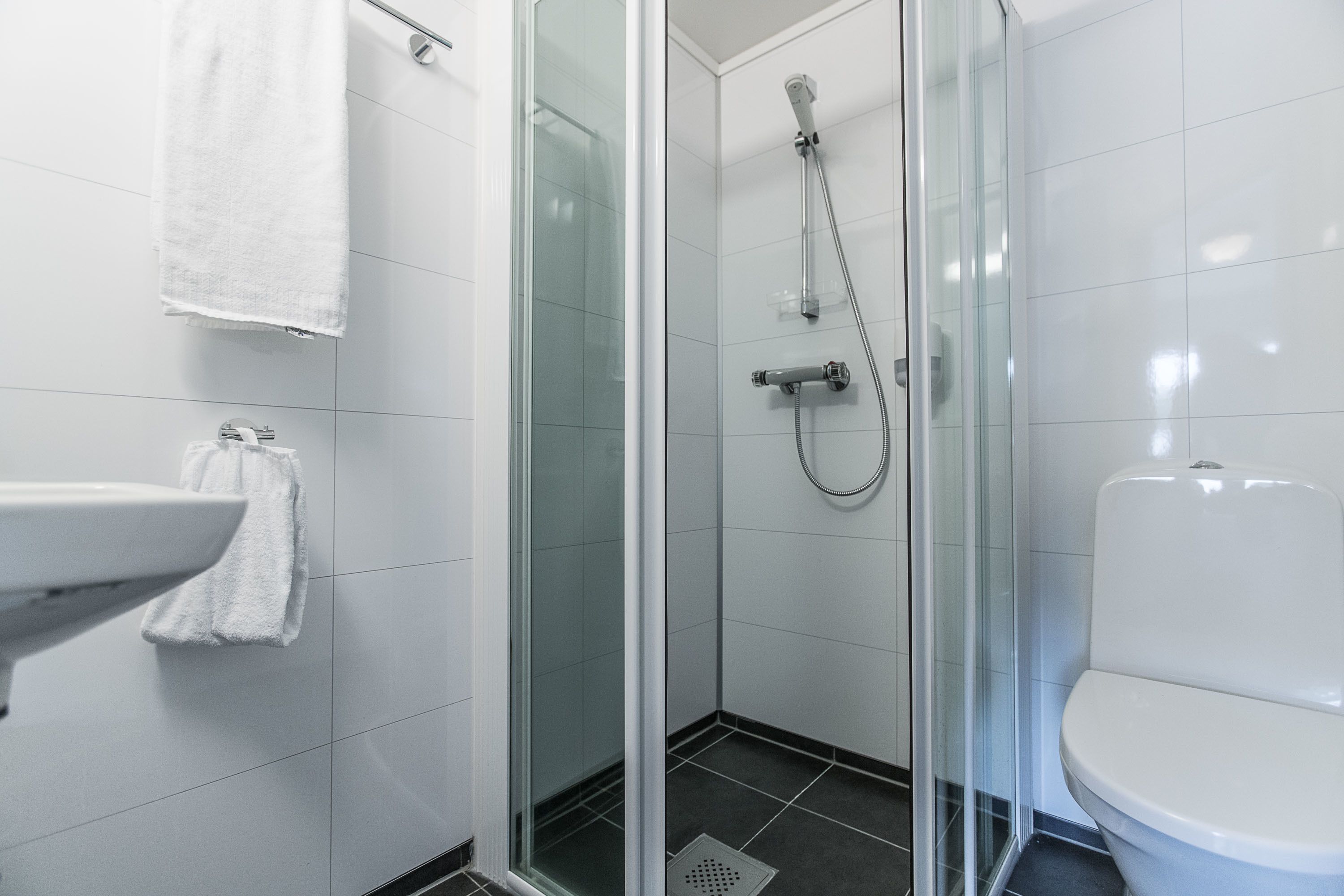 economy single room | bathroom | eco-friendly toiletries, hair dryer, towels