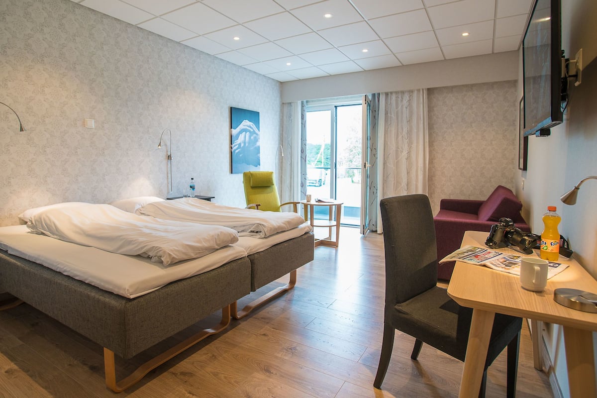 superior double room | pillow-top beds, individually decorated, individually furnished, desk