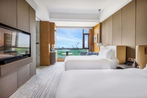 Ropa de cama de alta calidad y minibar