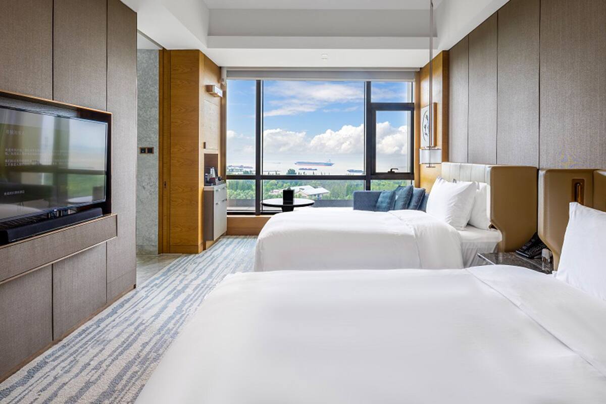 premium room, 2 single beds, river view | 1 bedroom, premium bedding, minibar, in-room safe