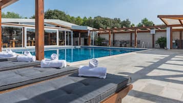 2 outdoor pools, open 8:00 AM to 9:00 PM, pool umbrellas, sun loungers