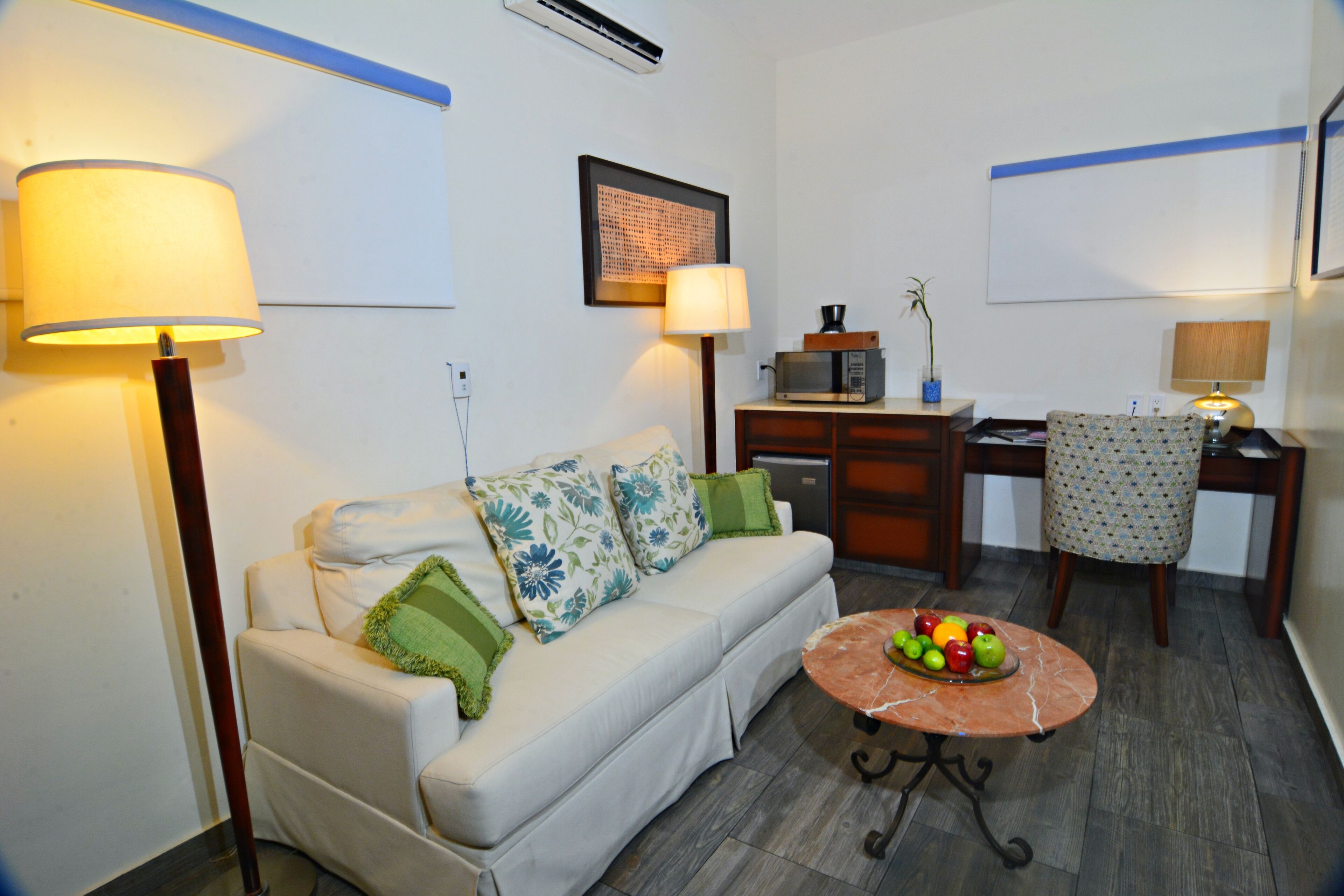 standard plus room | living area | 40-inch flat-screen tv with cable channels, tv